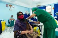  📷 A woman receives her vaccine shot in Kelapa Gading, North Jakarta. Elderly (above 60 years old) and teachers are part of this vaccination round 