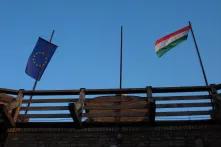 Photo of the uhngarian flag and the european flag