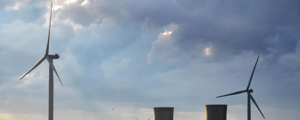 old nuclear power plant & new wind turbine